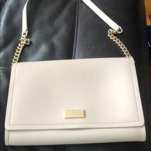 Cream colored Kate Spade envelope purse